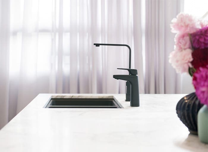 Billi XL Matte Black on kitchen bench next to mixer tap